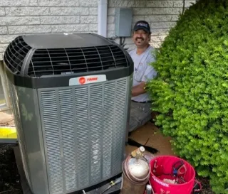 Our Technician Installing a Trane AC Unit